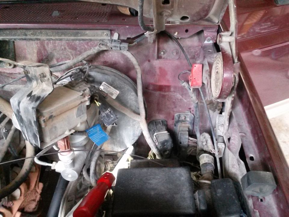 Engine bay wiring and brake booster assembly