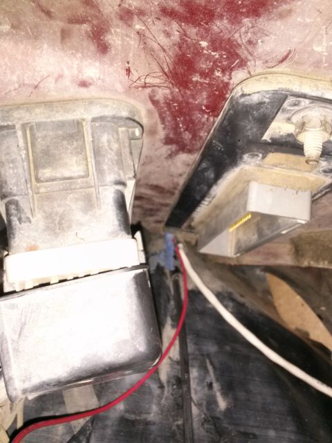 1996 Ford Bronco - This image shows a close-up view of electrical connectors and wiring within a vehicle's engine bay.