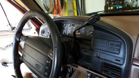 1996 Ford Bronco - Interior view of a 1996 Ford Bronco's dashboard, including the steering wheel and instrument panel.