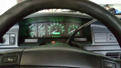 1996 Ford Bronco - The dashboard of a 1992 Ford Bronco displays illuminated gauges and controls.