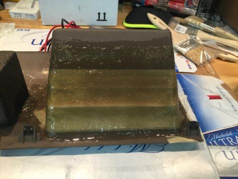 1996 Ford Bronco - A custom fiberglass part with wires is shown, possibly for a vehicle modification project.