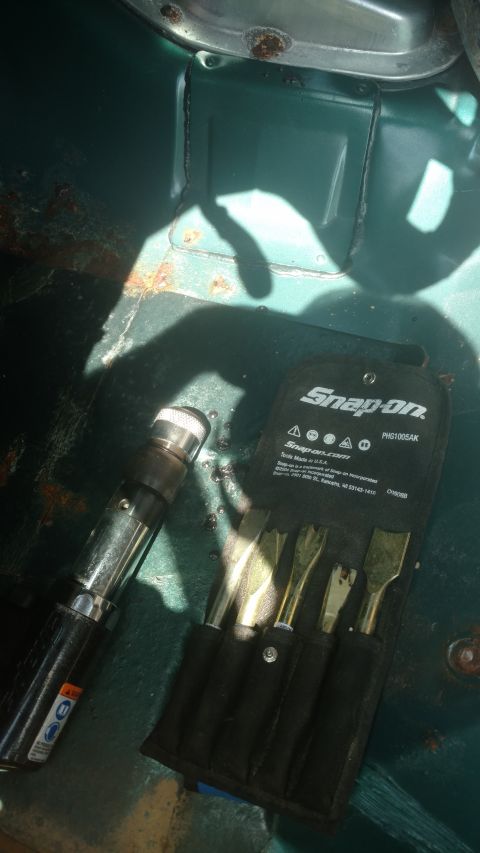 1996 Ford Bronco - I thought this would be cake with an air hammer. . Till it made a square hole in the floor pan that wasn't needed.