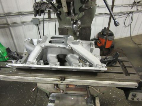 Intake manifold being machined on a milling machine