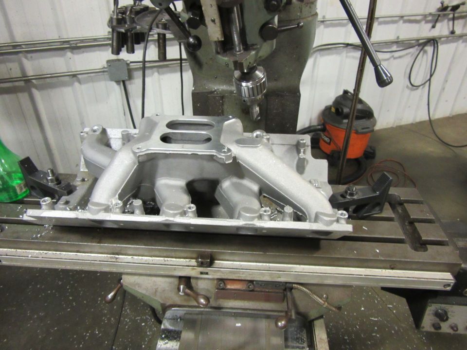 Intake manifold being machined on a milling machine