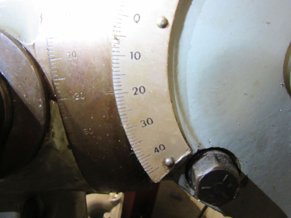 Close-up of a machine gauge with degree markings from 0 to 40