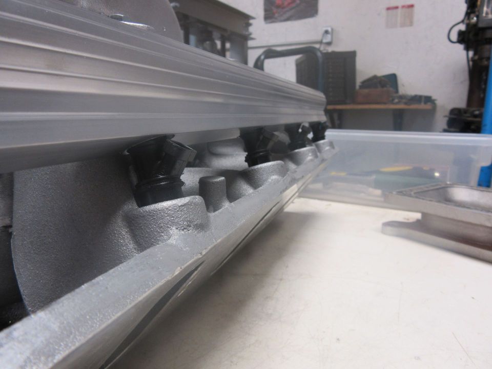 Engine intake manifold with visible valves
