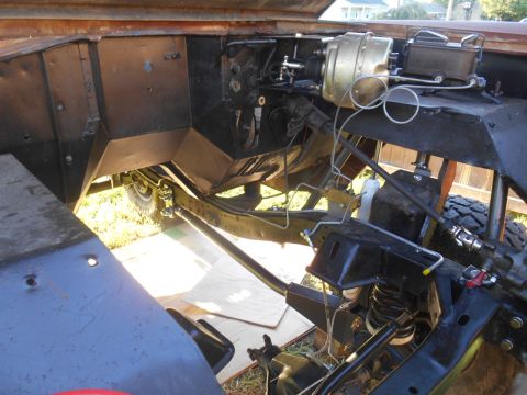 1972 Ford Bronco - Close-up view of the engine bay and chassis of a vehicle undergoing restoration.