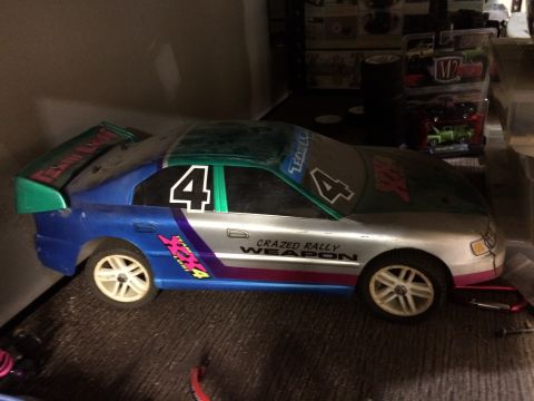 1989 Ford Bronco - This is a toy rally car with racing decals and the text 'CRAZED RALLY WEAPON'.