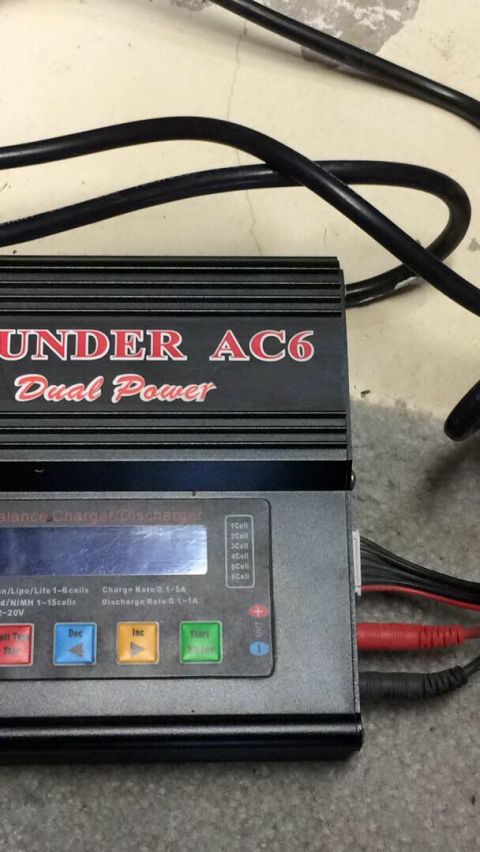 1989 Ford Bronco - Thunder AC6 Dual Power balance charger/discharger unit with visible text and buttons.