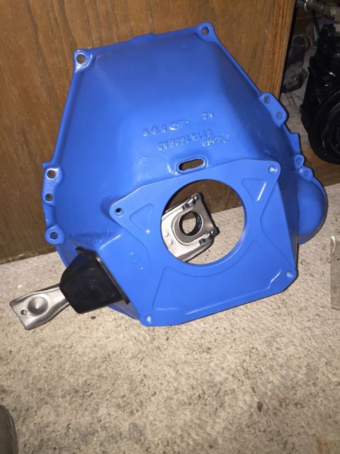 1978 Ford Bronco - A blue transmission bell housing with visible Ford branding and part number is shown.