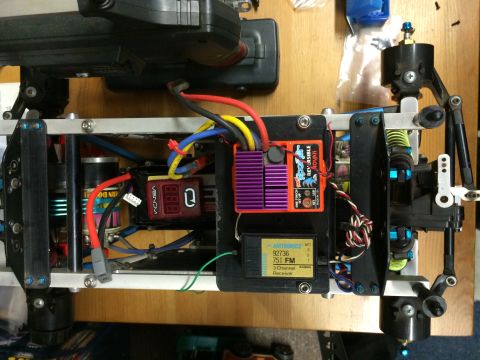 1989 Ford Bronco - A top-down view of the internal components of a radio-controlled car, including the motor, electronic speed controller, and receiver.