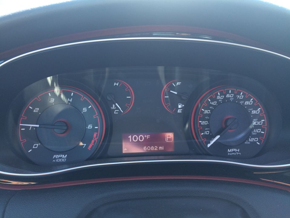 Dashboard gauges showing 100F and 6082 miles