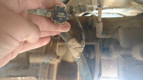 1996 Ford Bronco - Yahtzee!! Found the capped off harness connector above the transmission. This connector is where the short manual transfer case shift locat…
