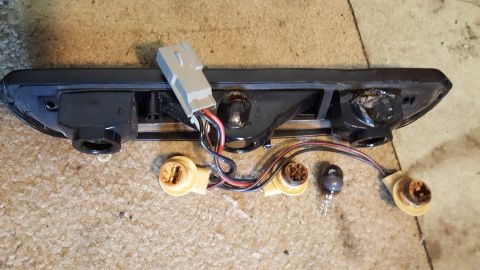 1996 Ford Bronco - This is a disassembled third brake light assembly, showing the wiring harness and bulb sockets.