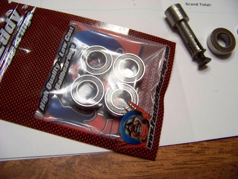 1999 Mercury Grand Marquis - A package of FastEddy Ballbearings is shown next to a metal part and a single ball bearing. The packaging is red and black with text that r…