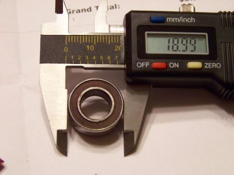 1999 Mercury Grand Marquis - A digital caliper measures the outer diameter of a bearing. The caliper reads 18.99 mm.