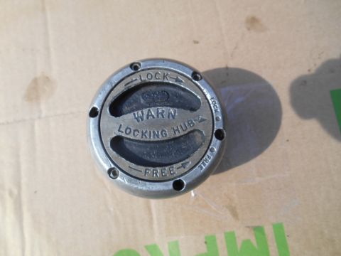 1972 Ford Bronco - A Warn locking hub is shown, indicating a part for a vehicle, not the vehicle itself.