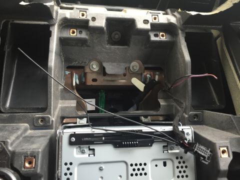 2013 Ford Taurus - Wires are injected into pins 6 and 12 on the harness, clearly labeled on the black connector - 6 is right above 12.