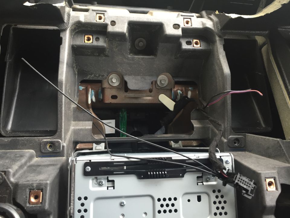 Wires are injected into pins 6 and 12 on the harness, clearly labeled on the black connector - 6 is right above 12.