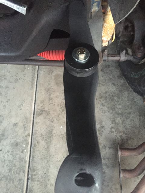 1978 Ford Bronco - Detail of a vehicle's suspension system, showing a bolted component and frame connection.