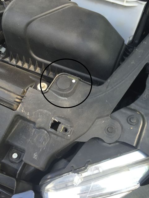 2013 Ford Taurus - hood pin install location.