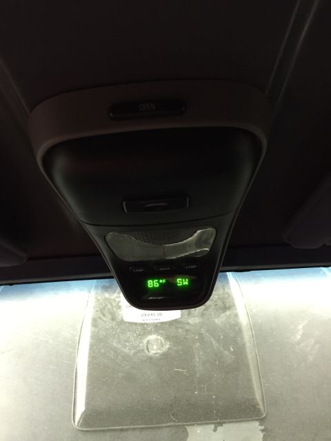 1988 Ford Bronco - The overhead console displays the temperature and compass direction.