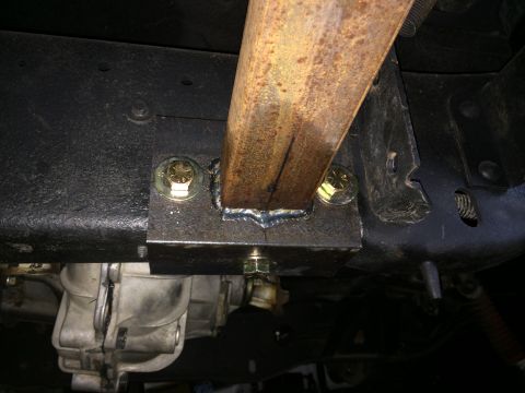 1988 Ford Bronco - Custom welded bracket attached to vehicle frame, likely for rock sliders.