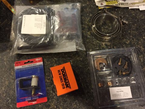 1995 Ford Bronco - New toys in the mail... Turbo rebuild kit, door hinge shims, exhaust weld on v band kit
