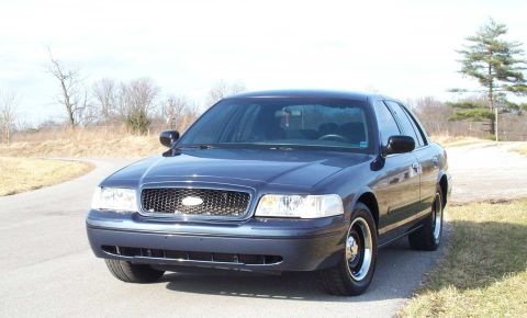 1998 Ford Crown Victoria - Note the 2001 P71 grille with the trim painted Medium Wedgewood Blue.