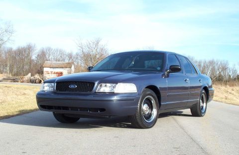 1998 Ford Crown Victoria - 1998 Ford Crown Victoria in a rural setting.
