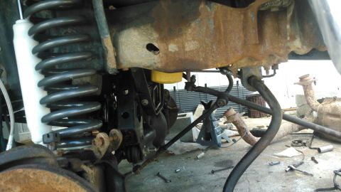 1996 Ford Bronco - side view. the filter is only slightly exposed from the bottom of the frame. it should be well protected