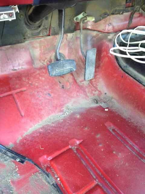 1978 Ford Bronco - The interior floor of a 1978 Ford Bronco shows the brake and accelerator pedals.