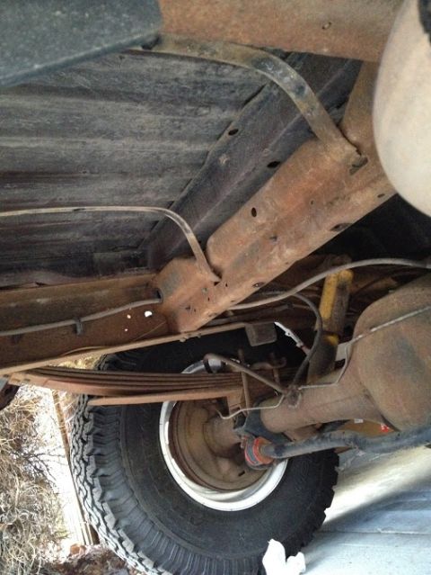 1978 Ford Bronco - Underside view of a 1978 Ford Bronco, showing the rear suspension and frame.