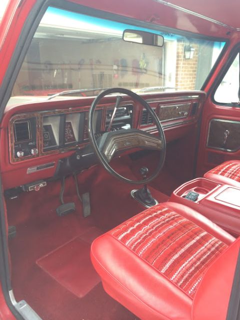 1978 Ford Bronco - Interior view of a 1978 Ford Bronco, showing the dashboard, steering wheel, and seats.