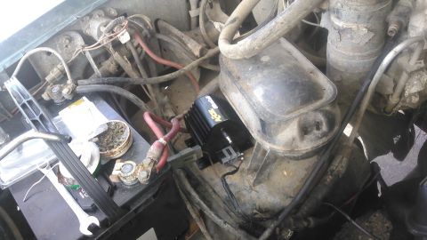 1996 Ford Bronco - due to the size of the coil, i decided the best place to mount it would be between the battery tray and the vacuum reservoir on the wheel w…