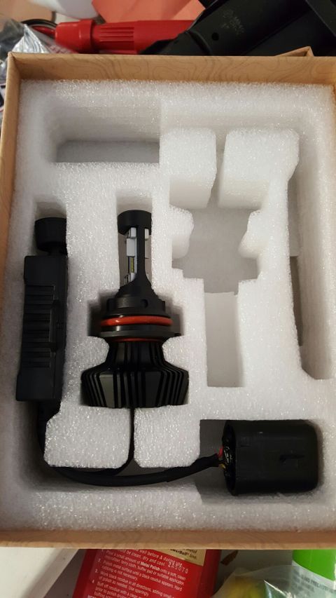 1996 Ford Bronco - LED headlight bulbs are packaged in a box with foam inserts, with a website address visible at the bottom.