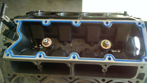 1985 Jeep CJ7 - Close-up of an engine block, showing the gasket sealing surface and internal components.