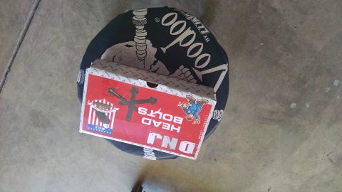 1985 Jeep CJ7 - A box of DNJ Head Bolts is displayed on a black Voodoo t-shirt.