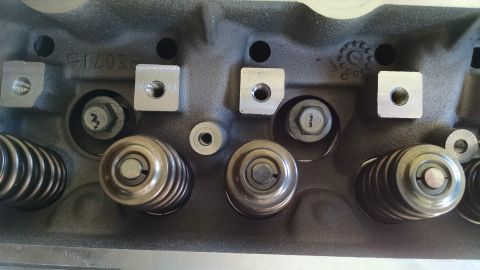 1985 Jeep CJ7 - Engine cylinder head detail with valve springs and fasteners visible. Part number '61703' is present.