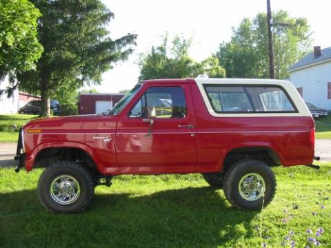 1981 Ford Bronco - Here she is after a 4"" lift, new 32" Dunlop Mud Radials, chrome rims of an 86 Bronco, and the custom front and rear bumpers I made.