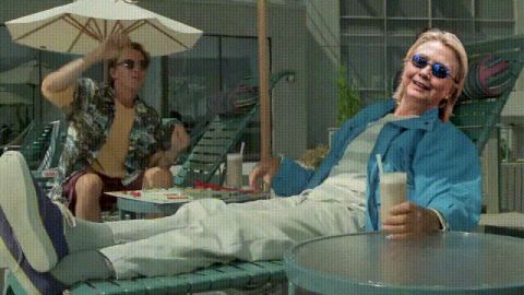 1995 Mercury Grand Marquis - People enjoying leisure time outdoors, with one person in a blue shirt and white pants.