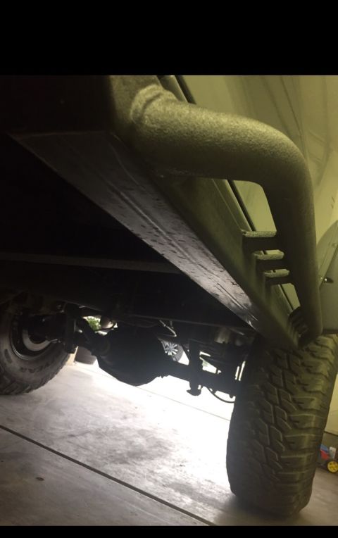 1988 Ford Bronco - This photo shows the rock sliders and undercarriage of a vehicle, not specific year or model details.