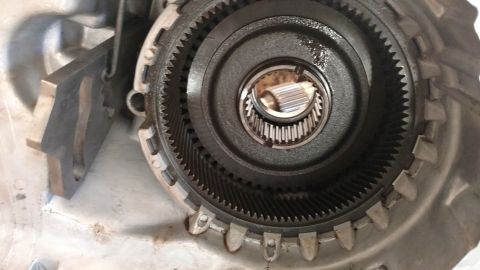 1996 Ford Bronco - Internal gears and splined shaft of a transfer case, likely part of a drivetrain upgrade.
