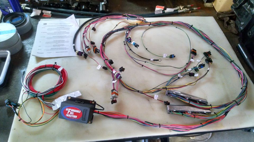 Automotive wiring harness with connectors and control module