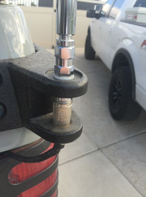 1988 Ford Bronco - Antenna mount detail on a vehicle, with another truck visible in the background.