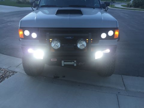 1988 Ford Bronco - This Ford Bronco features a winch and auxiliary lights on its front bumper.