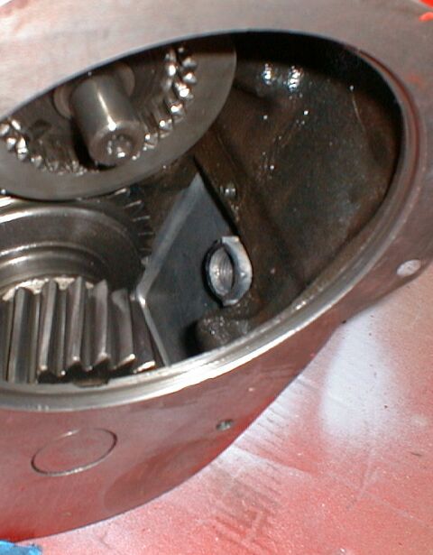1990 Ford Bronco - Internal components of a vehicle's transfer case are visible, showing meshing gears.