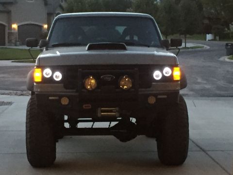 1988 Ford Bronco - This 1988 Ford Bronco features a custom front bumper, winch, and auxiliary lighting.