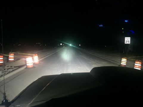 1988 Ford Bronco - Driving at night through a construction zone with limited visibility and traffic control devices.