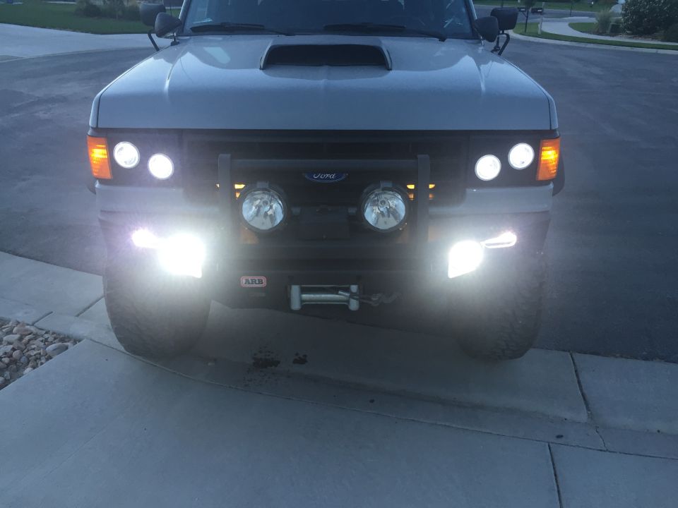 Gray Ford Bronco front view with aftermarket bumper and winch